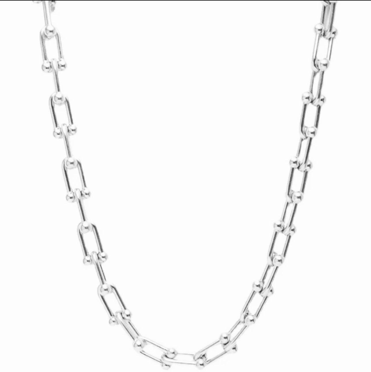Close up view of elegant 18k Silver plated stainless steel, designer inspired, Tiffany link chain necklace dupe with a smooth, polished finish, designed with a lightweight and tarnish resistant material for timeless sophistication.