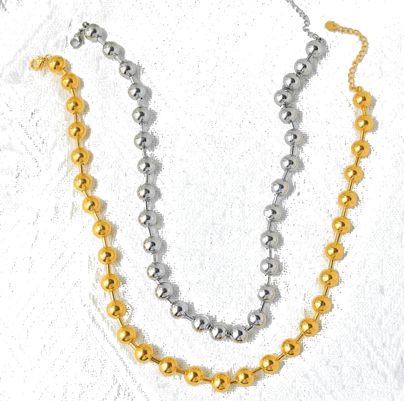 Close up view of elegant 18k Gold and Silver plated stainless steel, designer inspired,  Tiffany ball chain necklace dupe with a smooth, polished finish, designed with a lightweight and tarnish resistant material for timeless sophistication.
