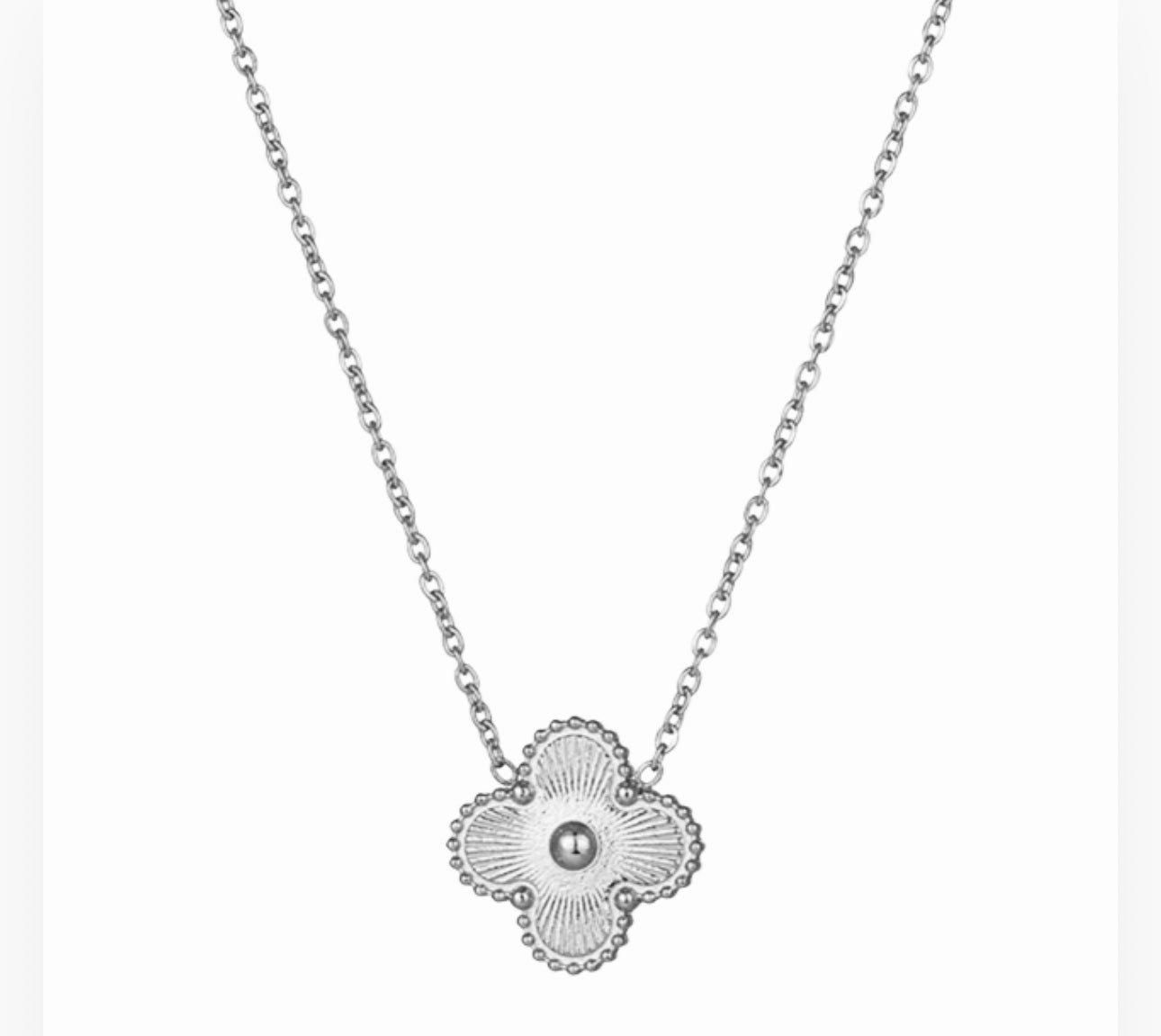 Close up front view of elegant 18K silver plated designer-inspired Van Cleef clover necklace.  Lightweight and versatile design, with long lasting, waterproof plating perfect for any occasion, from casual outings to formal events. 